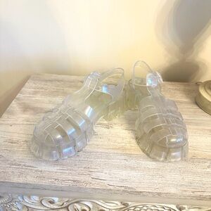 Urban Outfitters, size 8, clear jelly shoes.